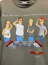 Load image into Gallery viewer, Vintage King of the Hill Real Men Don&#39;t Need Instructions Kahki Green 1998 T-Shirt: Medium
